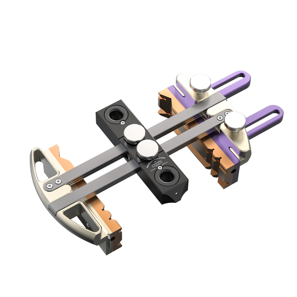 A digital rendering of the DJ-3 Universal Drilling Jig, showing a gray metal body with purple and gold colored accents, and adjustable parts for various drilling applications.
