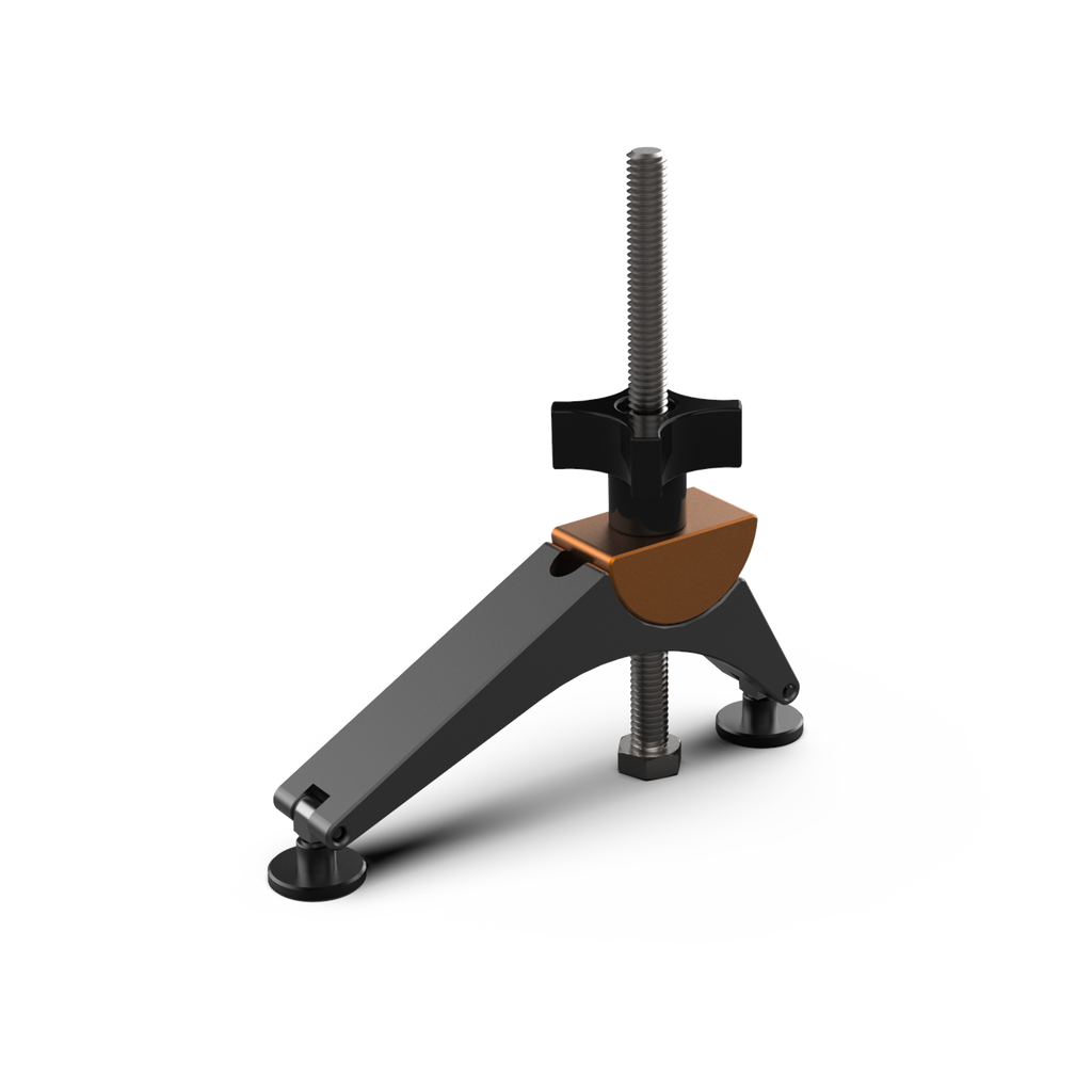 A digital rendering of a precision fence pivot clamp, predominantly gray with orange and black accents, designed for securing workpieces to a table saw.